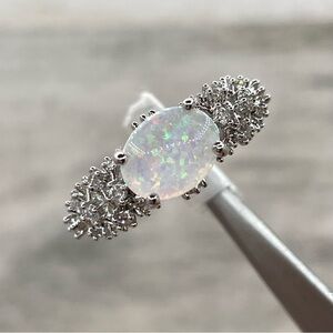 Beautiful Oval Side Sitting White Iridescent Faux Opal Silver Plated Ring